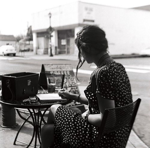 woman writing black and white