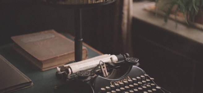 corona typewriter machine on desk
