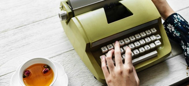 Woman writing typewriter